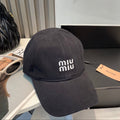MIUMIU BASEBALL CAP IN BLACK FABRIC BRAND EMBROIDERY