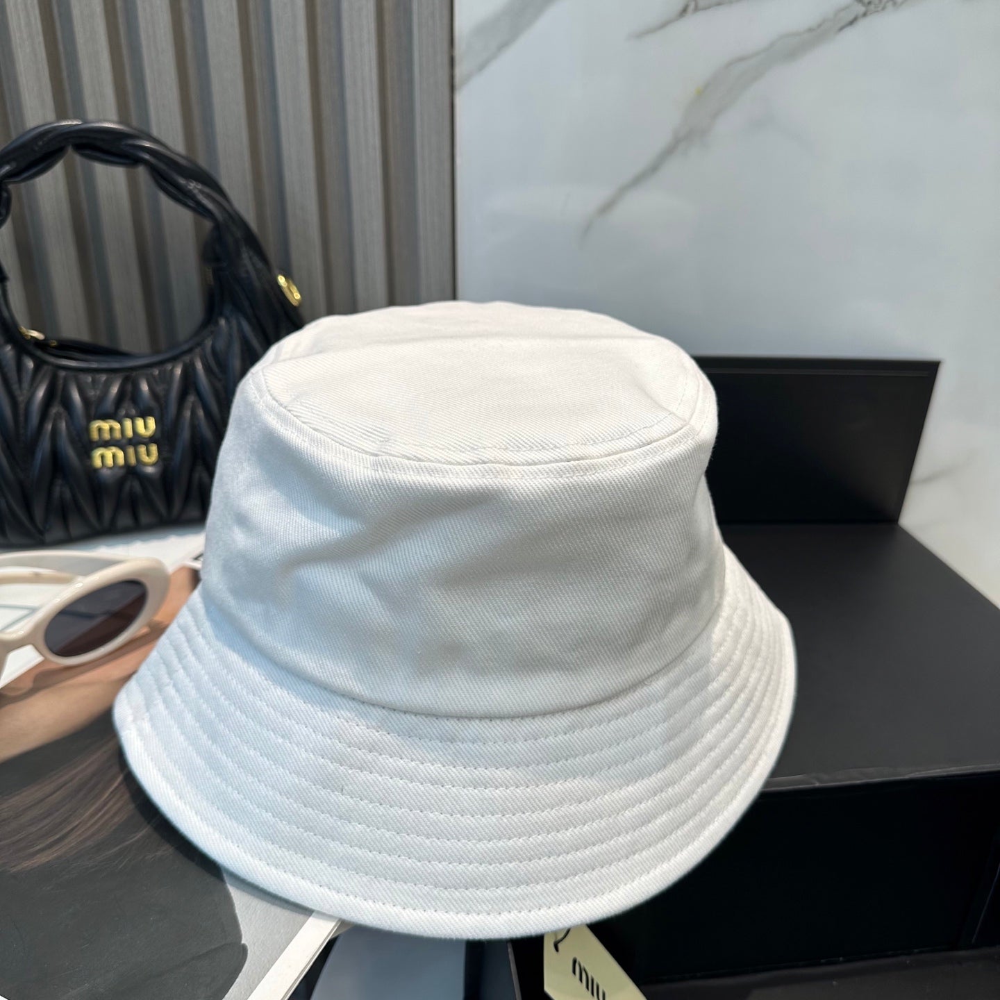 MIUMIU BUCKET HAT STYLE 30