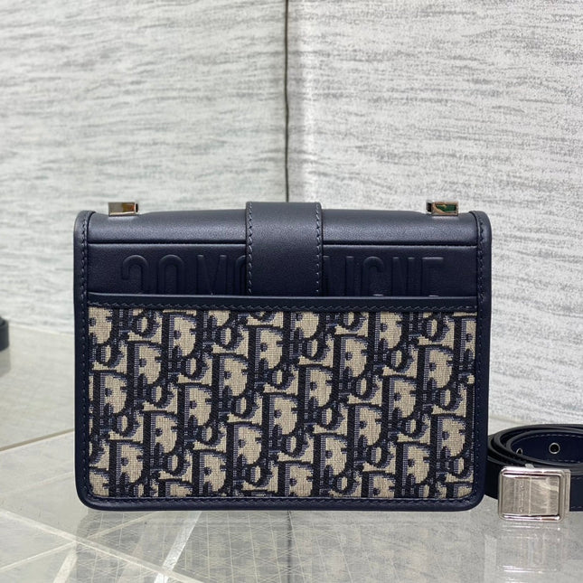 MONTAIGNE EAST-WEST 21 BAG WITH CHAIN IN NAVY BLUE LAMBSKIN AND MONOGRAM JACQUARD
