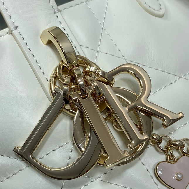 DIOR 25S TOUJOURS VERTICAL TOTE BAG 18 IN IVORY CALFSKIN WITH CHARM BRACELET STRAP