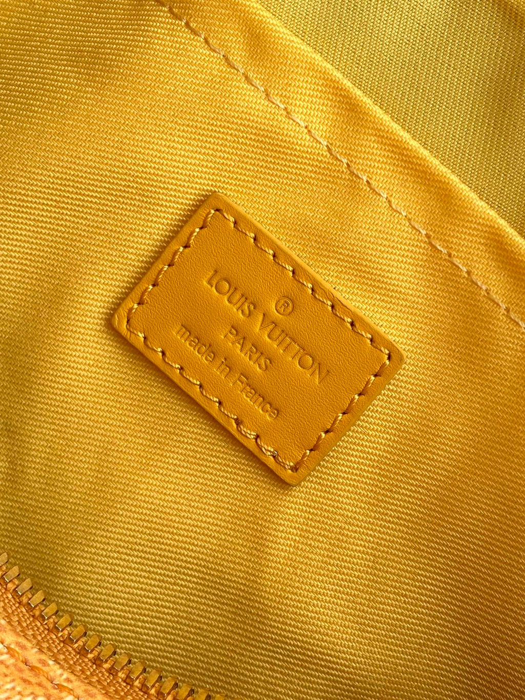 KEEPALL BANDOULIÈRE 25 IN ORANGE MONOGRAM HERITAGE CANVAS