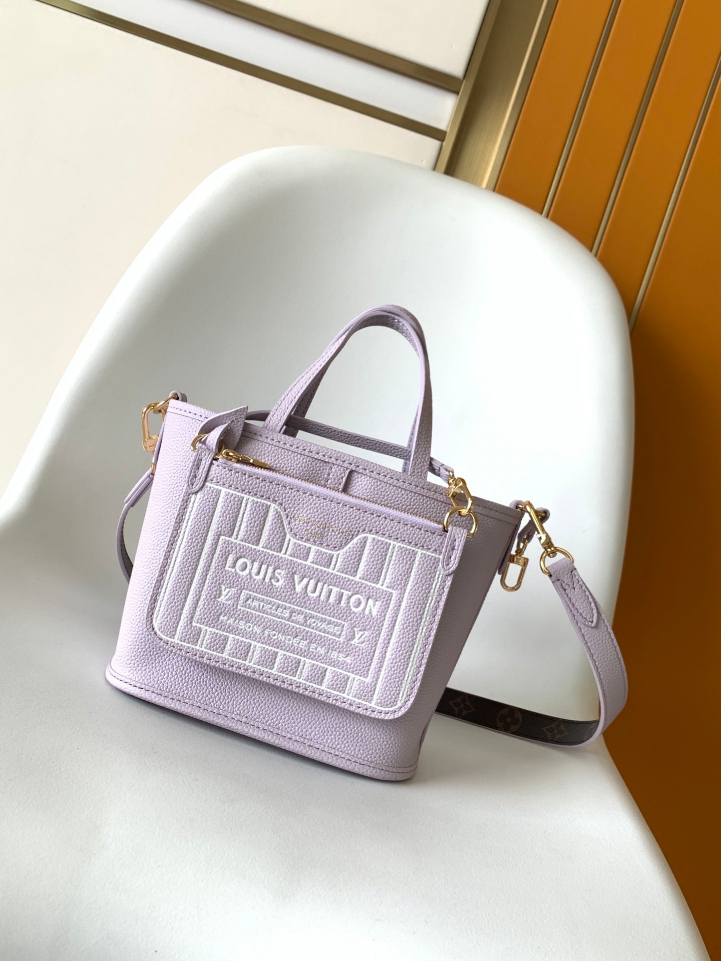 LV 25S NEVERFULL BANDOULIÈRE INSIDE OUT BB 24 IN LIGHT PURPLE AND BROWN CALFSKIN
