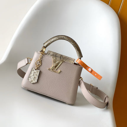 LV 26S CAPUCINES BAG 21 IN GRAYISH BEIGE TAURILLON CALFSKIN WITH GOLD HARDWARE