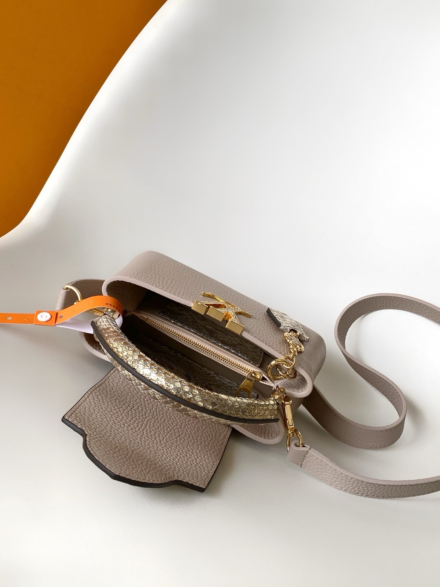LV 26S CAPUCINES BAG 21 IN GRAYISH BEIGE TAURILLON CALFSKIN WITH GOLD HARDWARE