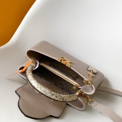 LV 26S CAPUCINES BAG 27 IN GRAYISH BEIGE TAURILLON CALFSKIN WITH GOLD HARDWARE