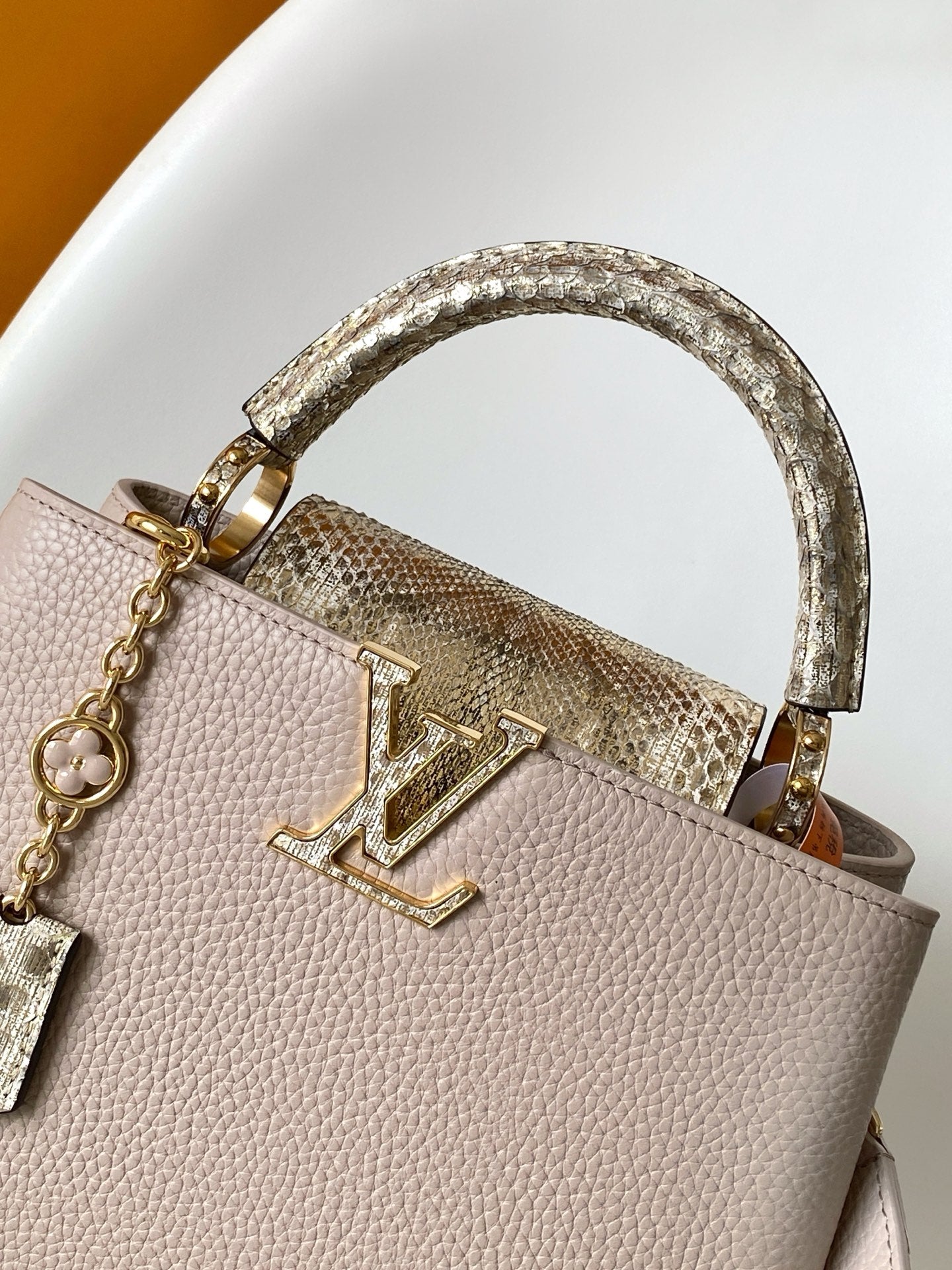 LV 26S CAPUCINES BAG 27 IN GRAYISH BEIGE TAURILLON CALFSKIN WITH GOLD HARDWARE