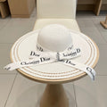 HAT IN WHITE RAFFIA WIDE-BRIM MIX BIG WHITE BOW