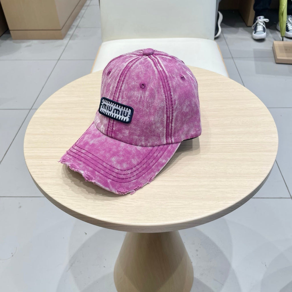 MIUMIU DISTRESSED FABRIC BASEBALL CAP IN PINK WITH EMBROIDERED LOGO