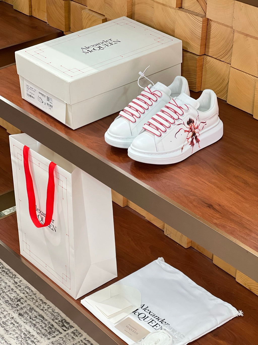 OVERSIZED SNEAKERS IN WHITE CALFSKIN NATRA GRAPHIC RED TRIM LACES