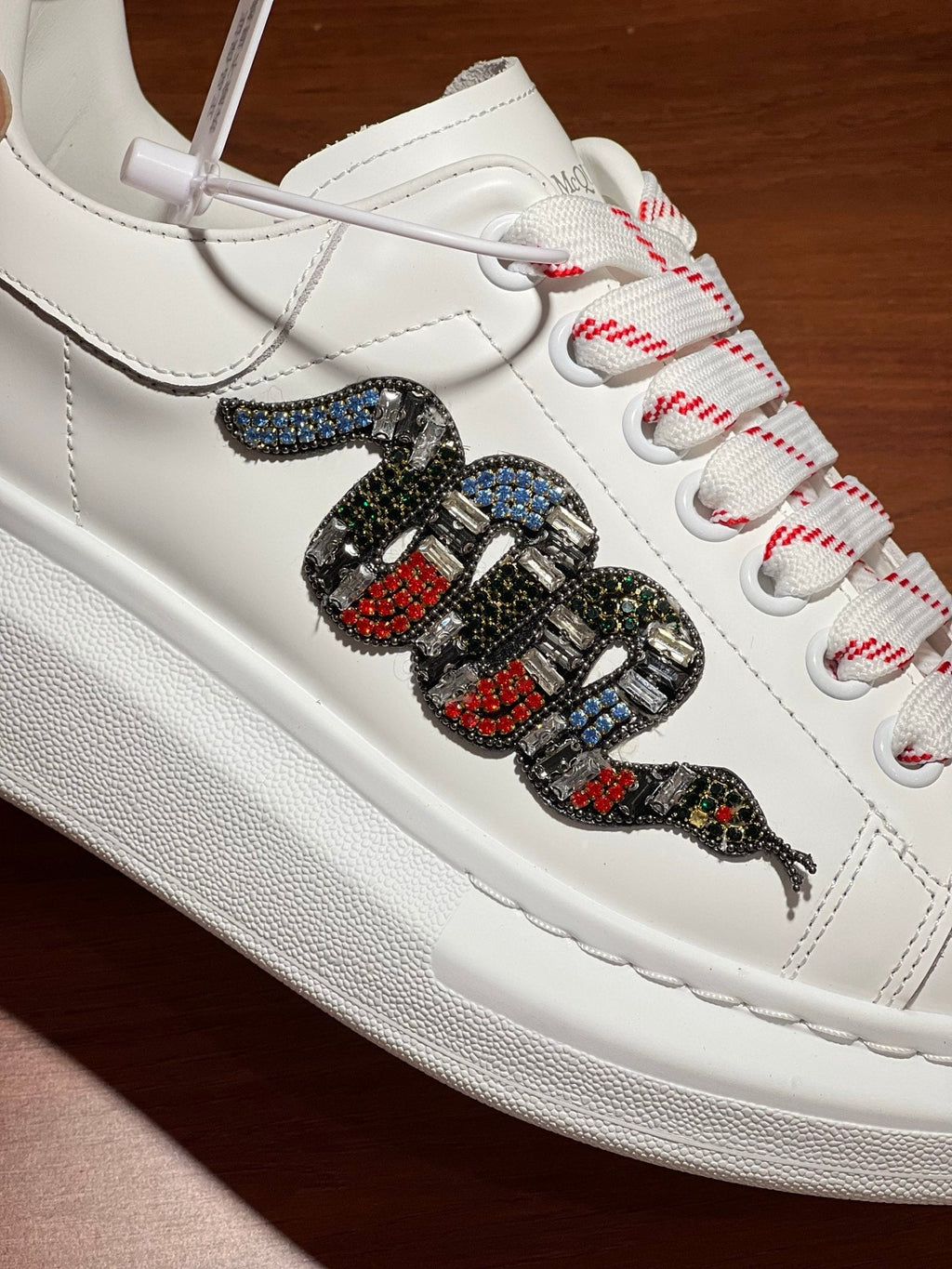 OVERSIZED SNEAKERS IN WHITE CALFSKIN EMBROIDERED CRYSTAL SNAKE