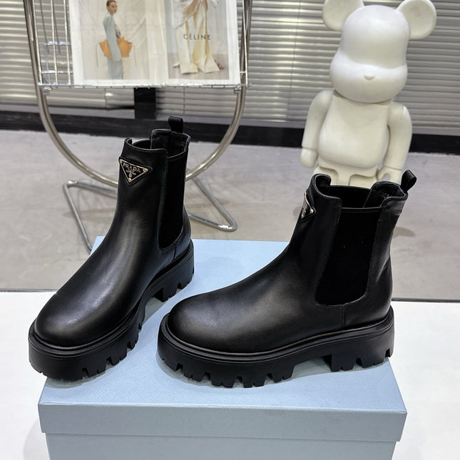 PRADA 25S RETRO PLATFORM MARTIN ANKLE BOOTS IN BLACK CALFSKIN