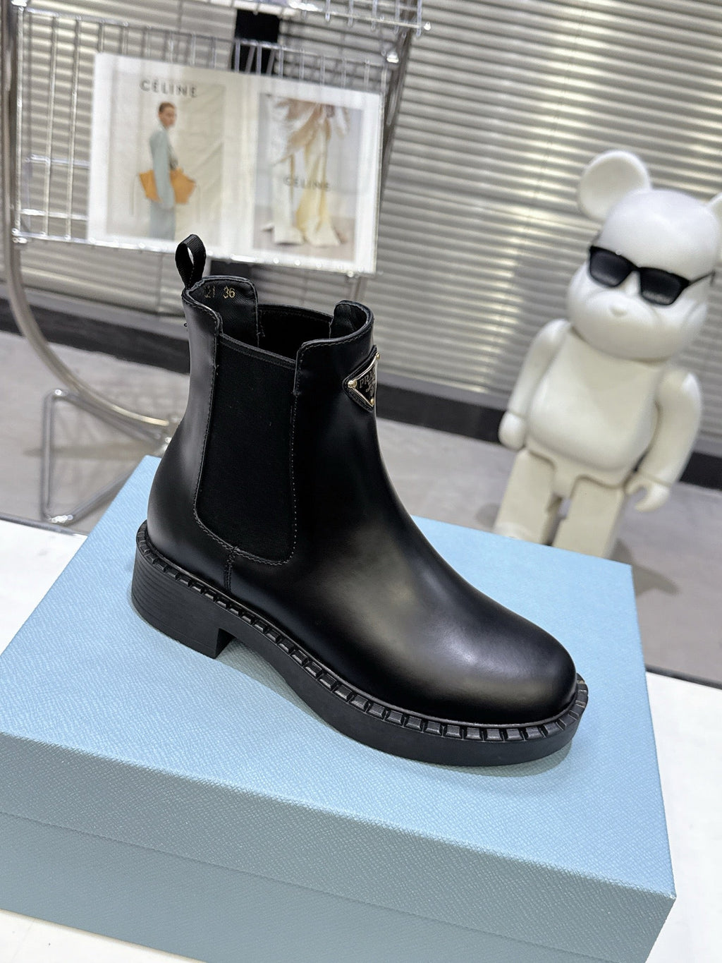 PRADA 25S RETRO PLATFORM MARTIN BOOTS IN BLACK CALFSKIN