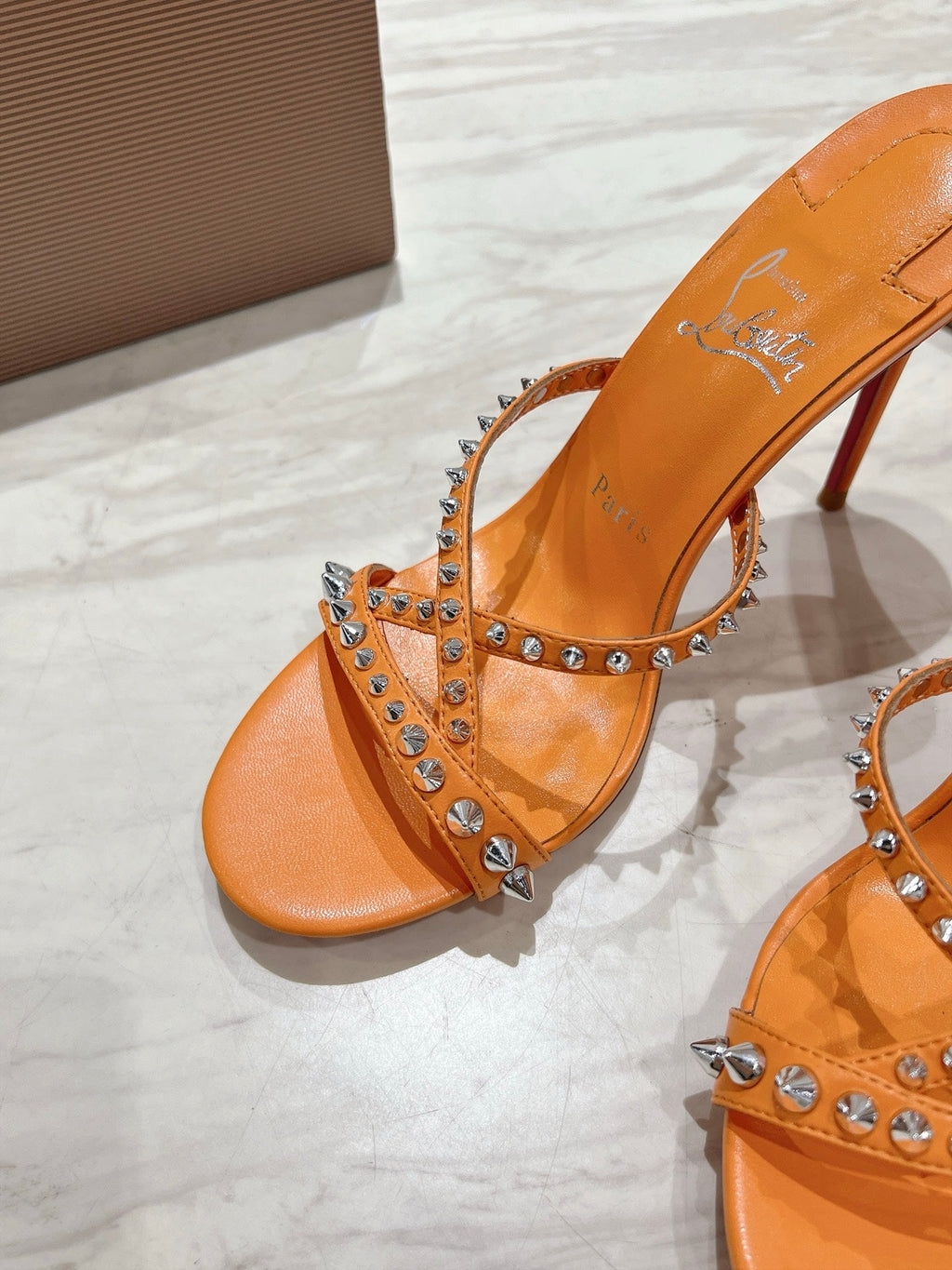 CRYSTAL GLITTER CRISS-CROSS STRAP SANDALS IN ORANGE CALFSKIN