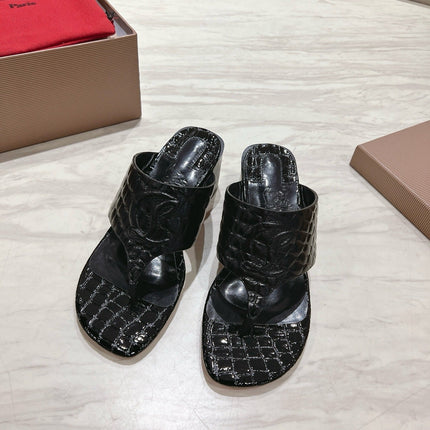 EMBOIDERED LOGO MULES IN BLACK EMBOSSED CALFSKIN
