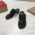 EMBOIDERED LOGO MULES IN BLACK EMBOSSED CALFSKIN