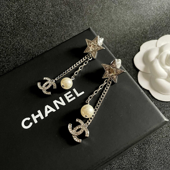 DOUBLE C STUD EARRINGS WITH STAR STONE DOUBLE CHAINS ONE WITH LOGO AND ONE WITH PEARL
