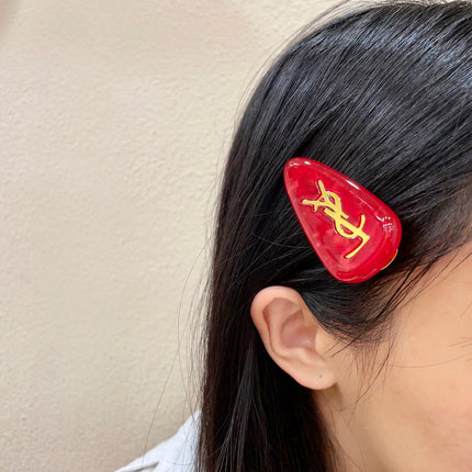 YSL 26S LOGO MARBLE EFFECT HAIR CLIP IN RED RESIN 621488