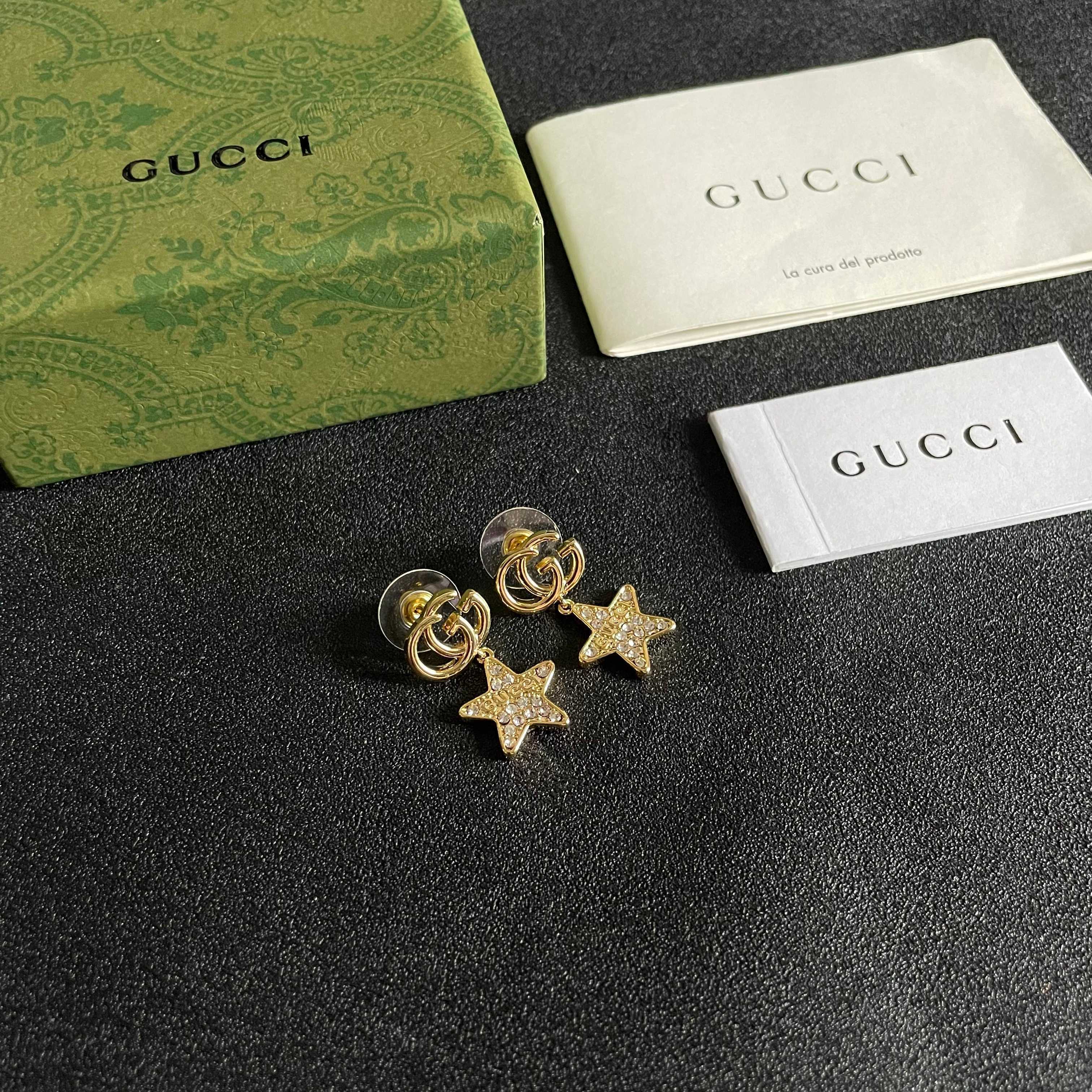 GUCCI 26S DOUBLE G STAR CRYSTAL DROP EARRINGS IN GOLD TONE METAL 627015