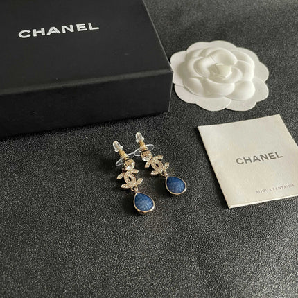 CHANEL 26S DOUBLE C CRYSTAL LOGO BLUE TEXTURED TEARDROP DANGLE EARRINGS IN GOLD METAL 629183