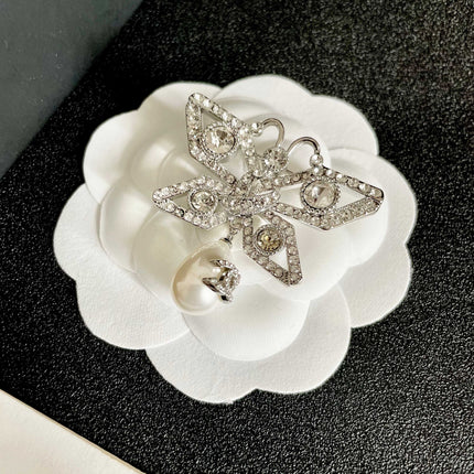 CHANEL 26S DOUBLE C LOGO CRYSTAL BOW PEARL DROP BROOCH 629165