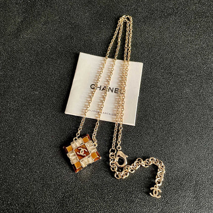 CHANEL 26S DOUBLE C LOGO AMBER CRYSTAL SQUARE PENDANT NECKLACE IN GOLD METAL 633294