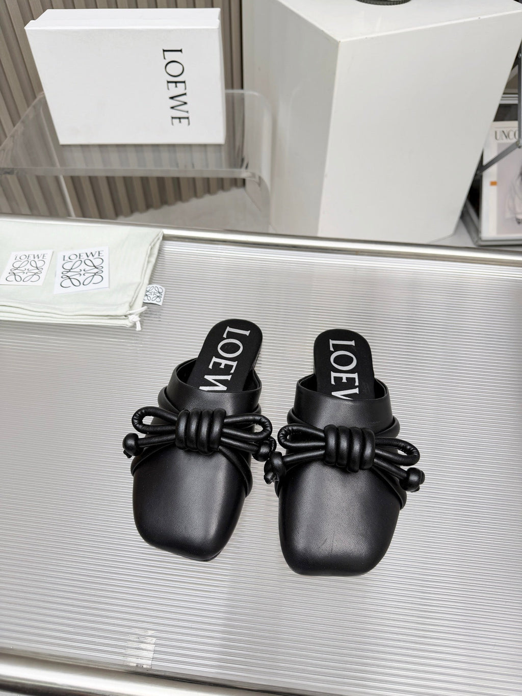 LOEWE 26S MULE LOAFERS IN BLACK CALFSKIN KNOT DETAIL