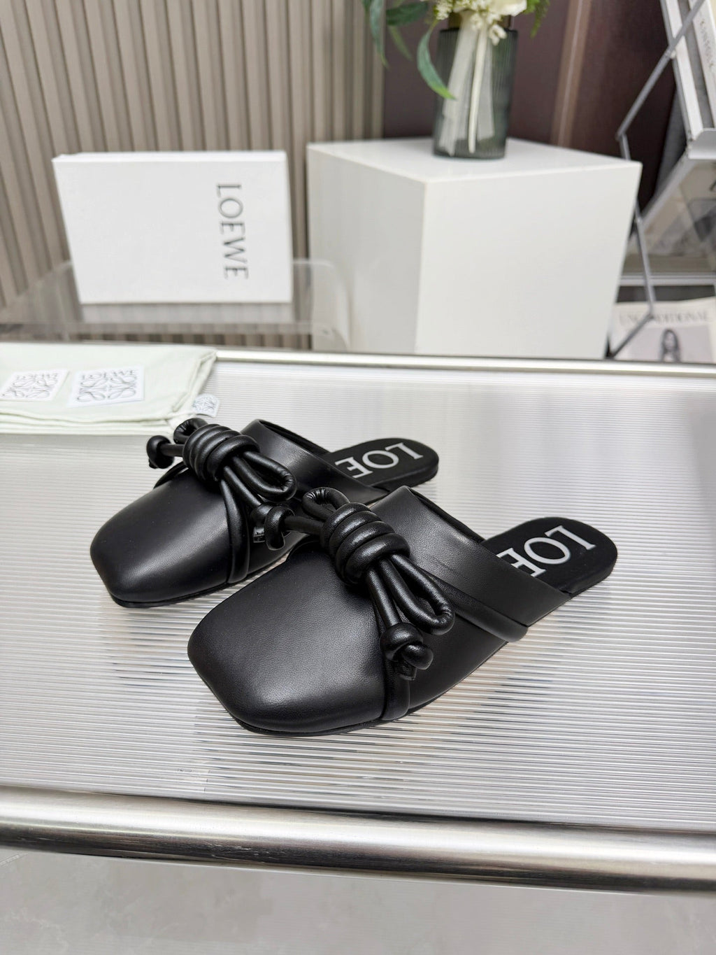 LOEWE 26S MULE LOAFERS IN BLACK CALFSKIN KNOT DETAIL
