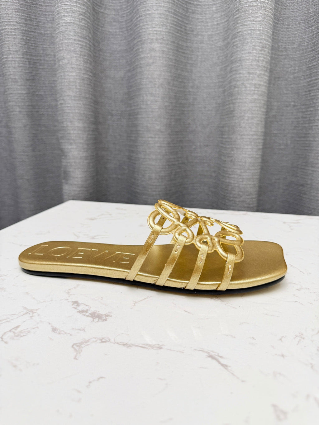 LOEWE 26S PETAL ANAGRAM SLIDE IN GOLD SOFT CALFSKIN