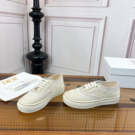 DIOR 26S LOW TOP SNEAKERS IN BEIGE CANVAS WITH WHITE LACE TRIM & LOGO PRINT