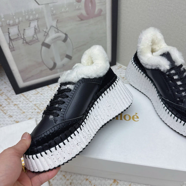 CHLOÉ 26S WEDGE SOLE SNEAKERS IN BLACK CALFSKIN