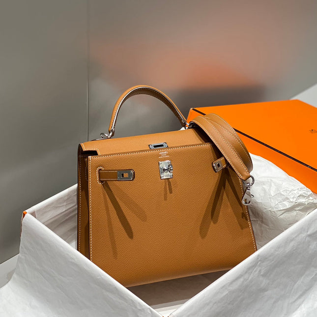 KELLY 25CM IN GOLD EPSOM CALFSKIN SILVER HARDWARE