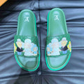 LV SLIPPERS IN SEA GREEN MONOGRAM CALFSKIN