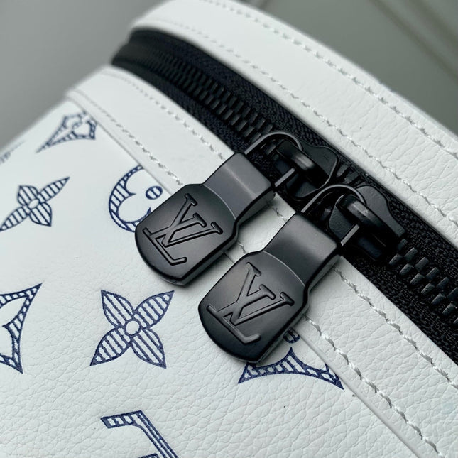 DISCOVERY PM BACKPACK 38 IN WHITE MONOGRAM LAMBSKIN