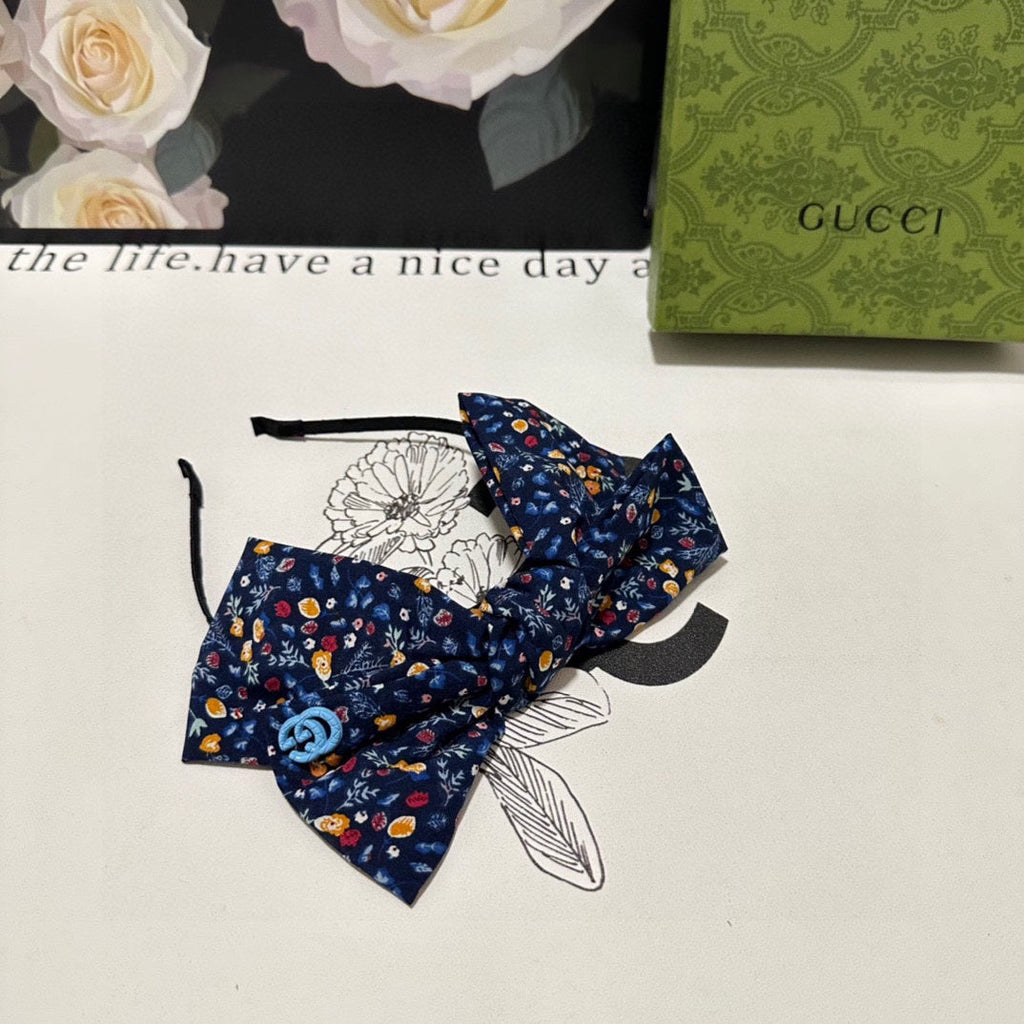 HAIRBAND IN NAVY BLUE FLORAL FABRIC 385854