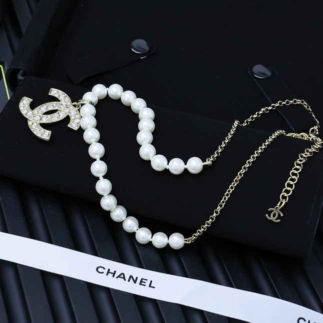 25P PEARL NECKLACE IN LIGHT GOLD STAR & HEART DOUBLE C PENDANT
