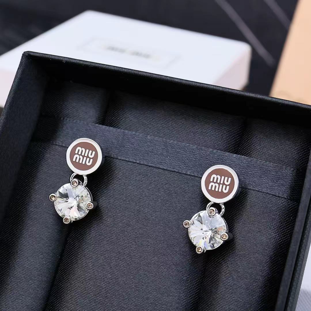 MIUMIU 26S CRYSTAL DROP LOGO STUD EARRINGS IN SILVER TONE METAL 626892