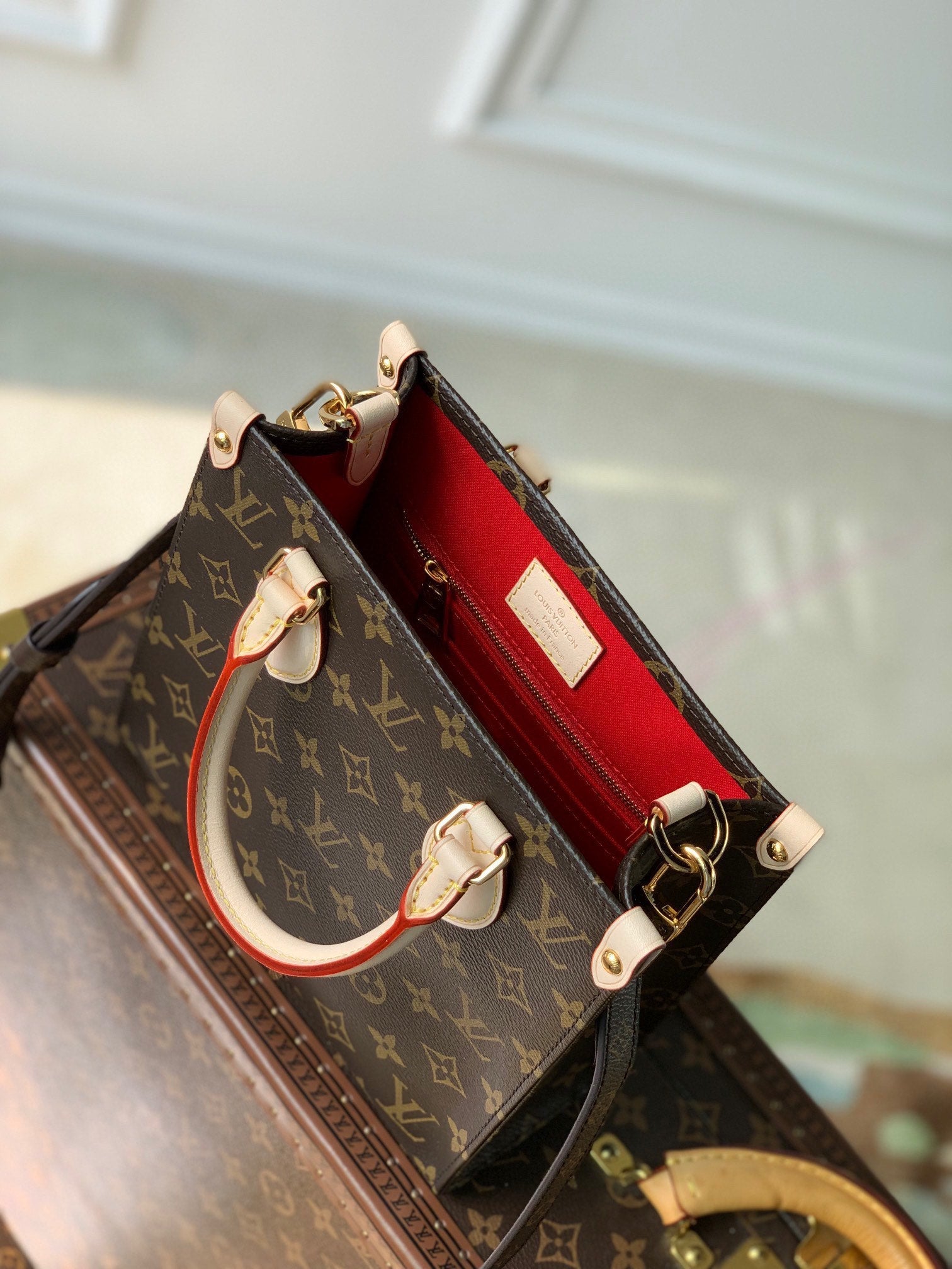 SAC PLAT 22 IN BROWN MONOGRAM COATED CANVAS AND CALFSKIN GOLD HARDWARE