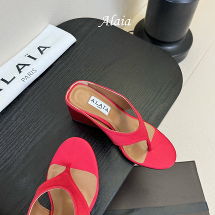 ALAIA WEDGE THONG SANDALS 25S IN RED SATIN