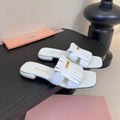 MIUMIU 26S FLAT SLIPPERS IN WHITE CALFSKIN