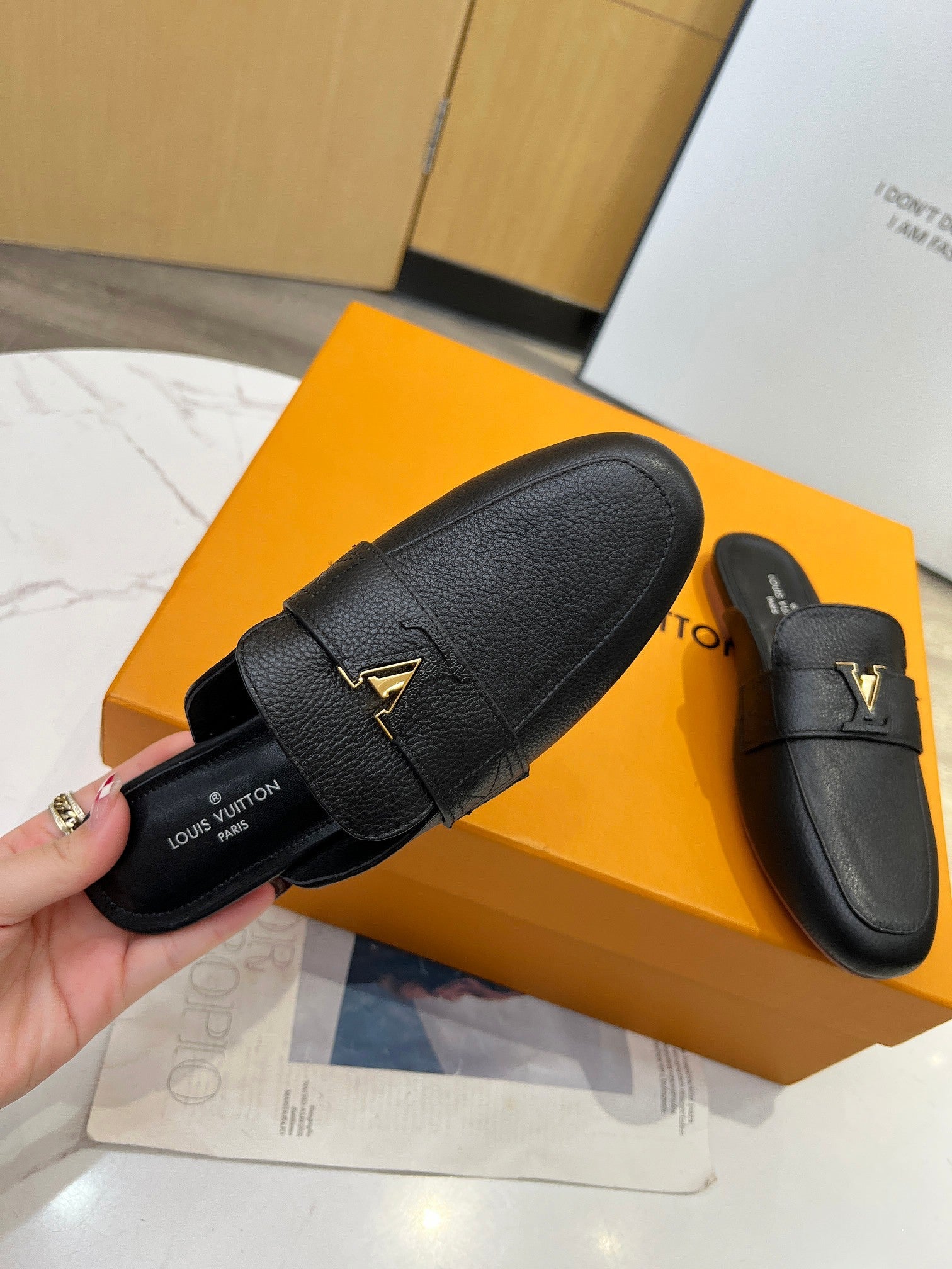 LV 26S MARE OPEN-BACK LOAFERS IN BLACK GRAINED CALFSKIN