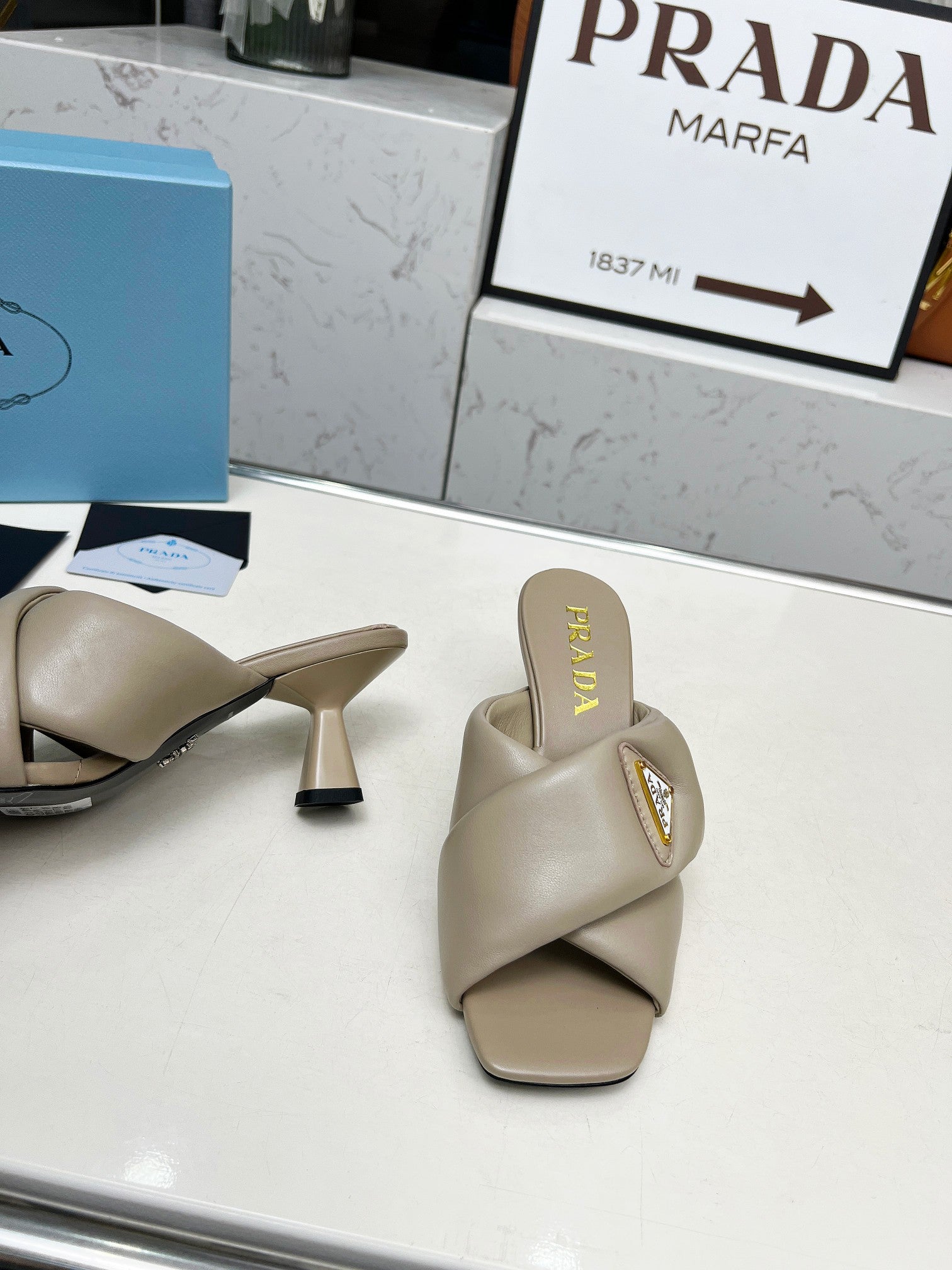 PRA CROSS MULE HEELS IN BEIGE CALFSKIN WITH PADDED STRAPS