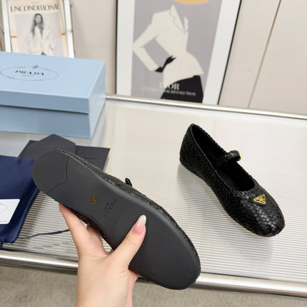 PRADA 26S MARY JANE FLATS IN BLACK WOVEN CALFSKIN