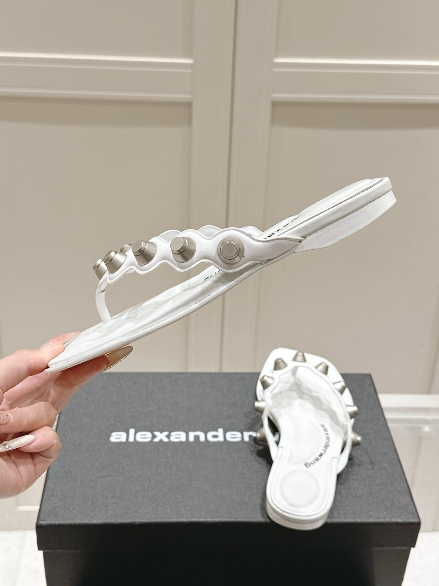 RHODES STUDDED THONG SANDALS IN WHITE CALFSKIN