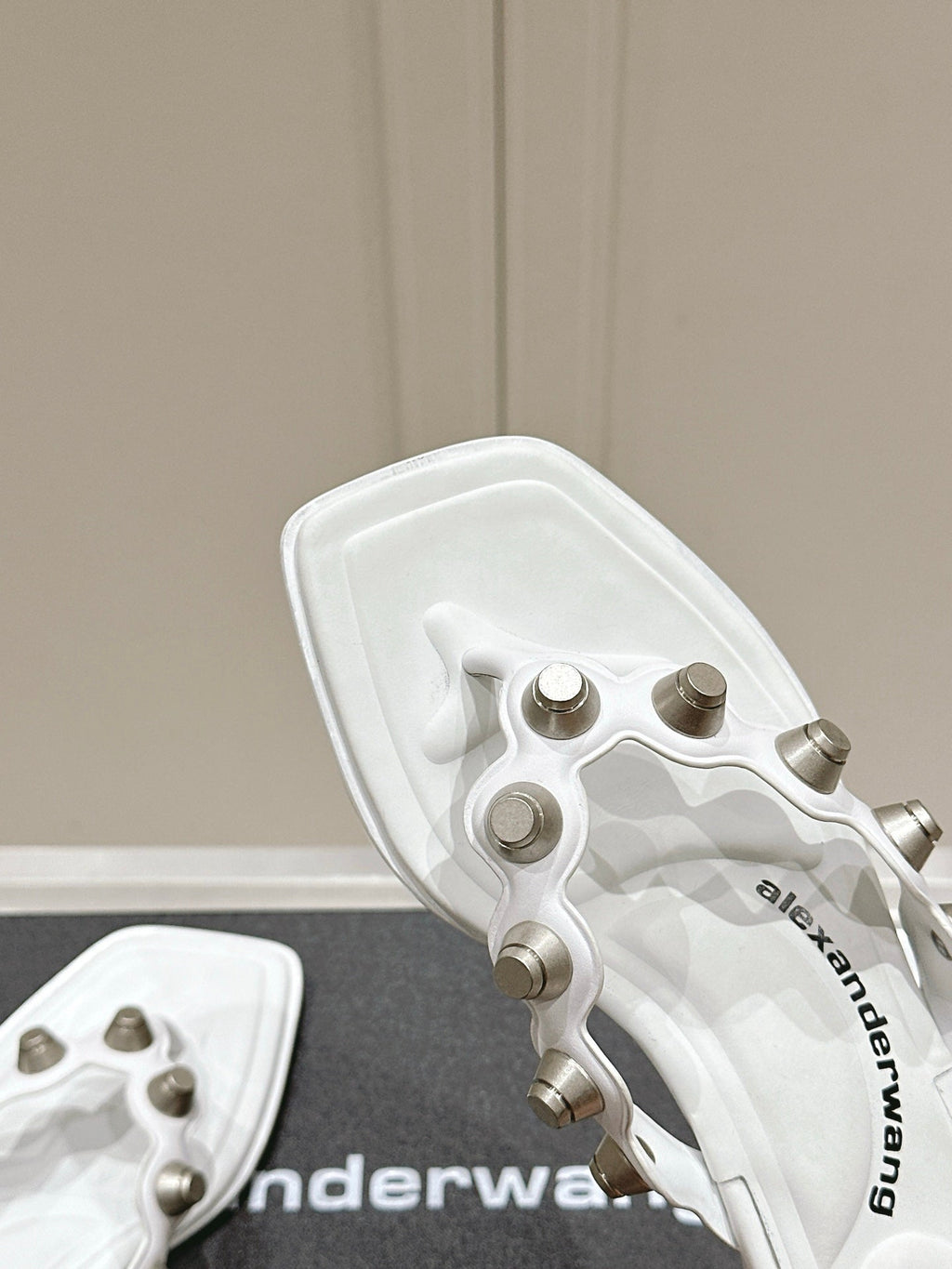 RHODES STUDDED THONG SANDALS IN WHITE CALFSKIN