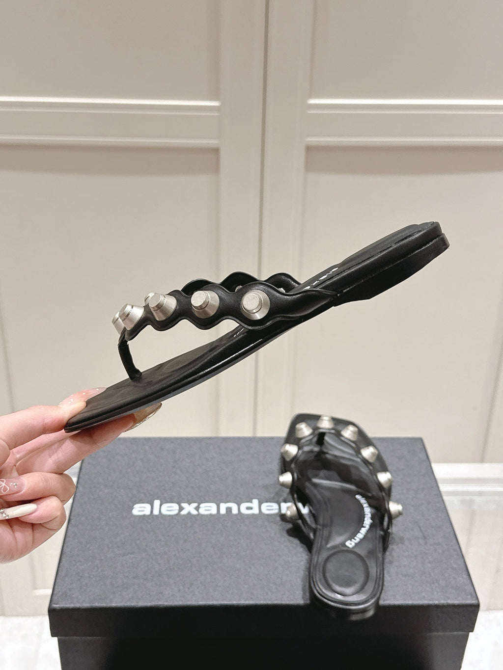 RHODES STUDDED THONG SANDALS IN BLACK CALFSKIN