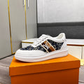 LV TRAINER IN WHITE EMBOSSED CALFSKIN AND MONOGRAM FABRIC