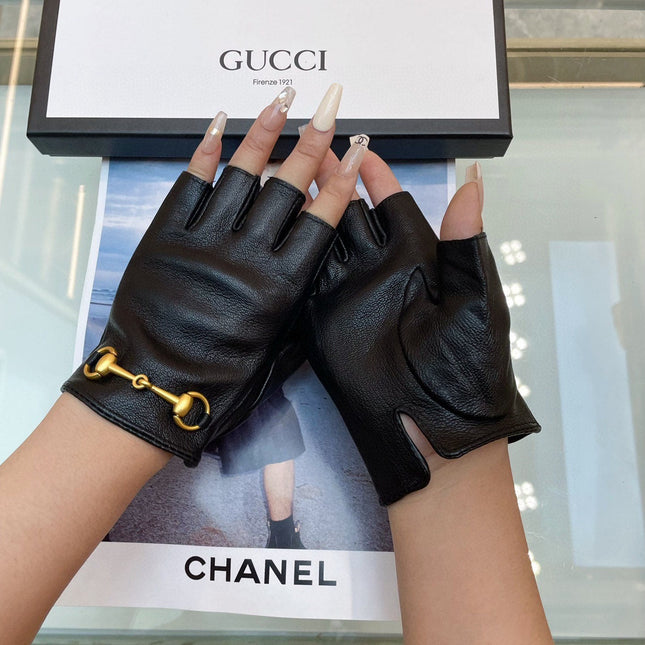 FINGERLESS GLOVES IN BLACK LAMBSKIN WITH GOLD HORSEBIT 432606