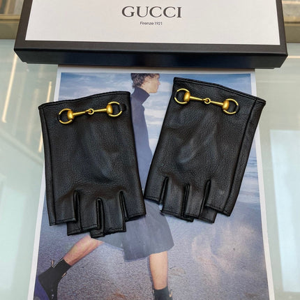 FINGERLESS GLOVES IN BLACK LAMBSKIN WITH GOLD HORSEBIT 432606