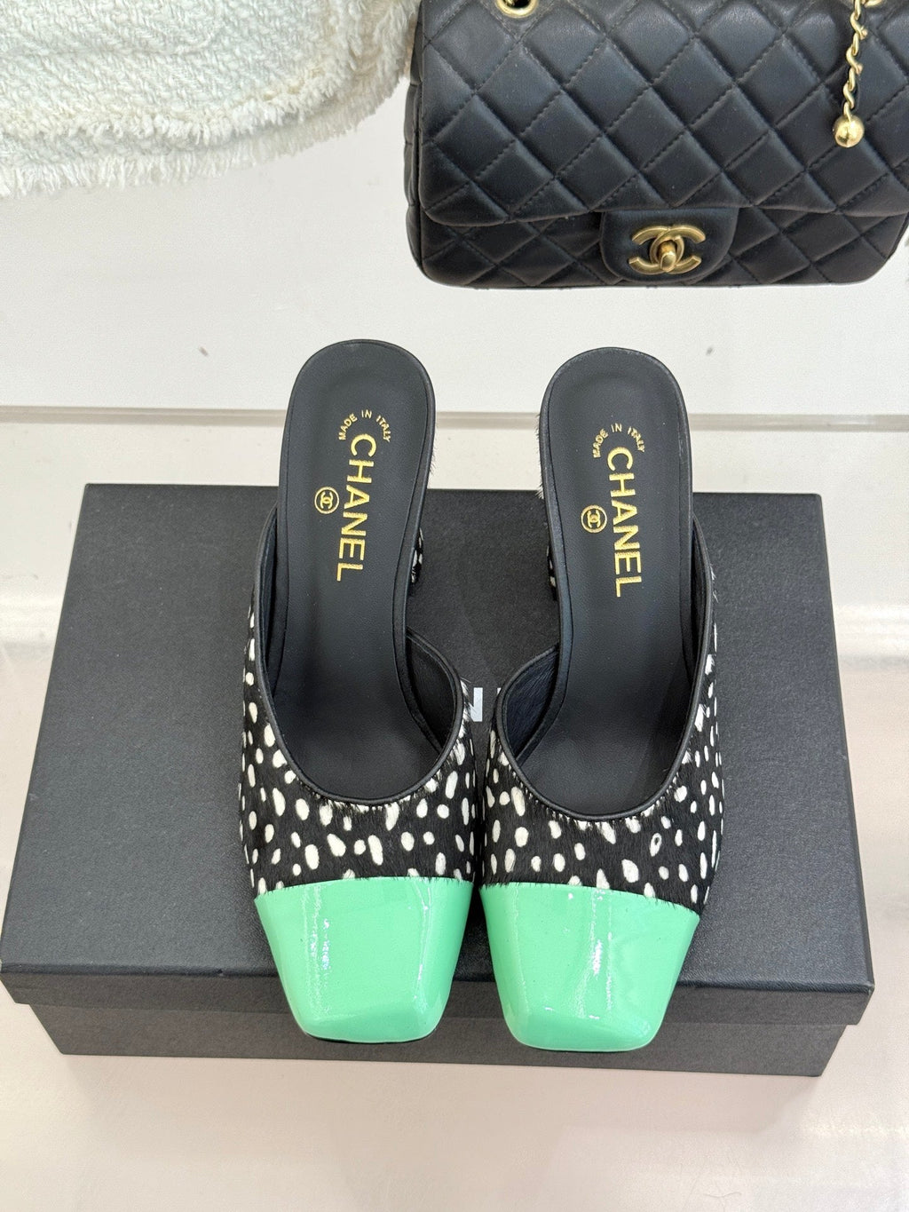 CHANEL POLKA DOT PATTERN MULES IN BLACK MIX GREEN FUR