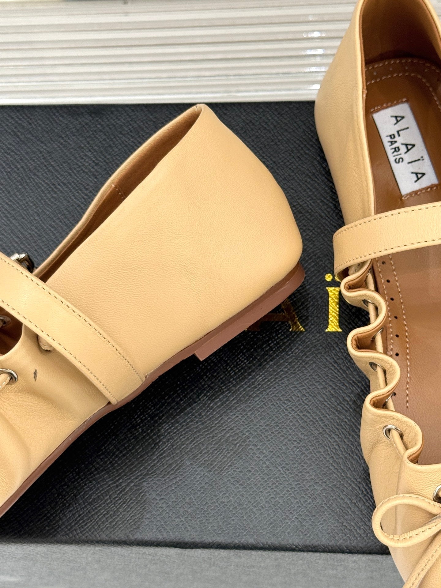 ALAIA 26S MARY JANE FLATS IN LIGHT YELLOW BEIGE LAMBSKIN WITH BOW
